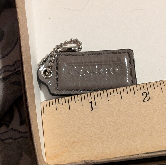 Coach Grey PatentLeather Hang Tag With Silver Chain
